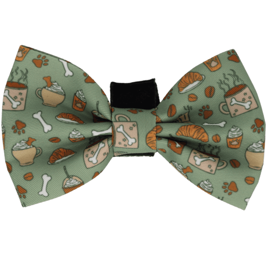 Green bow tie with food-themed pattern on a black background