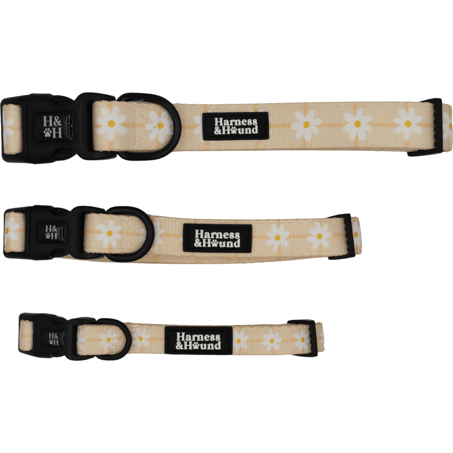 Three dog collars with floral pattern and 'Harness & Hound' branding on a black background