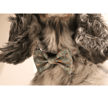 close up of bone appétit bow tie featuring coffee cups and pastries